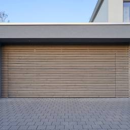 Bramy garażowe – ceny bram segmentowych, rolowanych, uchylnych, rozwiernych