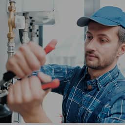 Podłączenie pralki do odpływu – zasady, wysokości i koszt 2025