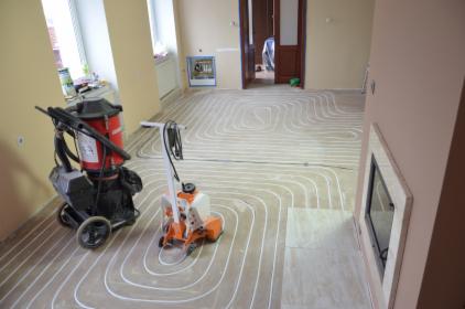 Wykonanie ogrzewania podłogowego przy pomocy frezarki