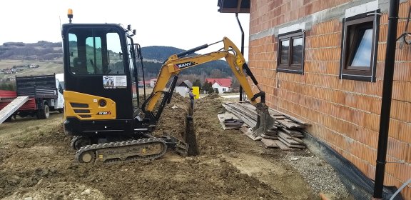 Uslugi minikoparka ( wykopy,skarpowanie,rownanie itd) ,uslugi wiertnica fi 220mm,skoczek