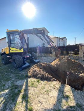 Usługi koparka Mecalac 12