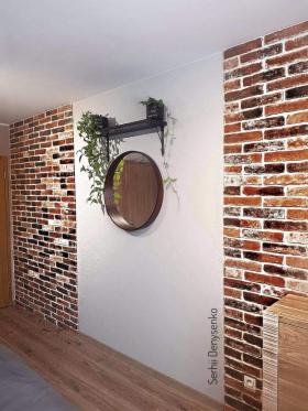 Położenie kamnia dekoracyjnego ( koszt 3,5 zł za szt)małowanie sciany