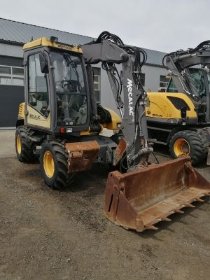 USŁUGI KOPARKĄ ŁADOWARKA MECALAC 12