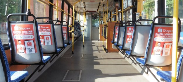 Reklama tramwajowa / autobusowa na oparciach siedzeń