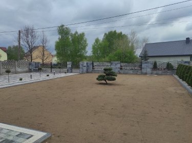 Kompleksowe wyrównanie, niwelacjai, odwodnienie terenu oraz zakładanie trawników