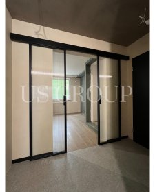 Drzwi przesuwne w stalowej ramie z przeszkleniem