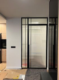 Drzwi rozwierane, przesuwne, pivotowe stalowe z przeszkleniem