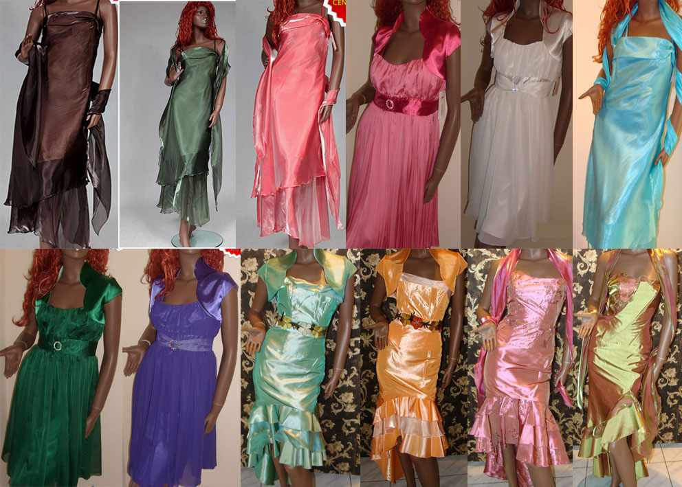 Kolekcja sukien wizytowych i wieczorowych na manekinach, w tym modele z bolerkami i szalami, w różnych kolorach i fasonach, prezentowane na tle wzorzystej tapety.