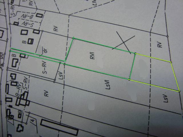 Skan mapy działki w Mosinie, z zaznaczonymi granicami, widoczne oznaczenia RV, RVI, LSV, LSVI.
