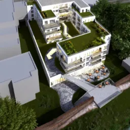 Wizualizacja z lotu ptaka nowoczesnego budynku apartamentowego z zielonymi dachami i tarasami, z aranżacją miejsc siedzących na zewnątrz, prezentująca architekturę z elementami ekologicznymi.