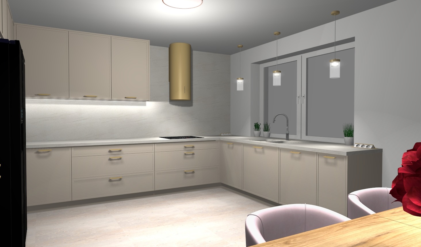 Wizualizacja beżowej kuchni z złotymi akcentami: okap tuba, podłużne uchwyty, lampy wiszące. Ujęcie na zabudowę kuchenną, z fragmentem stołu i krzesła.