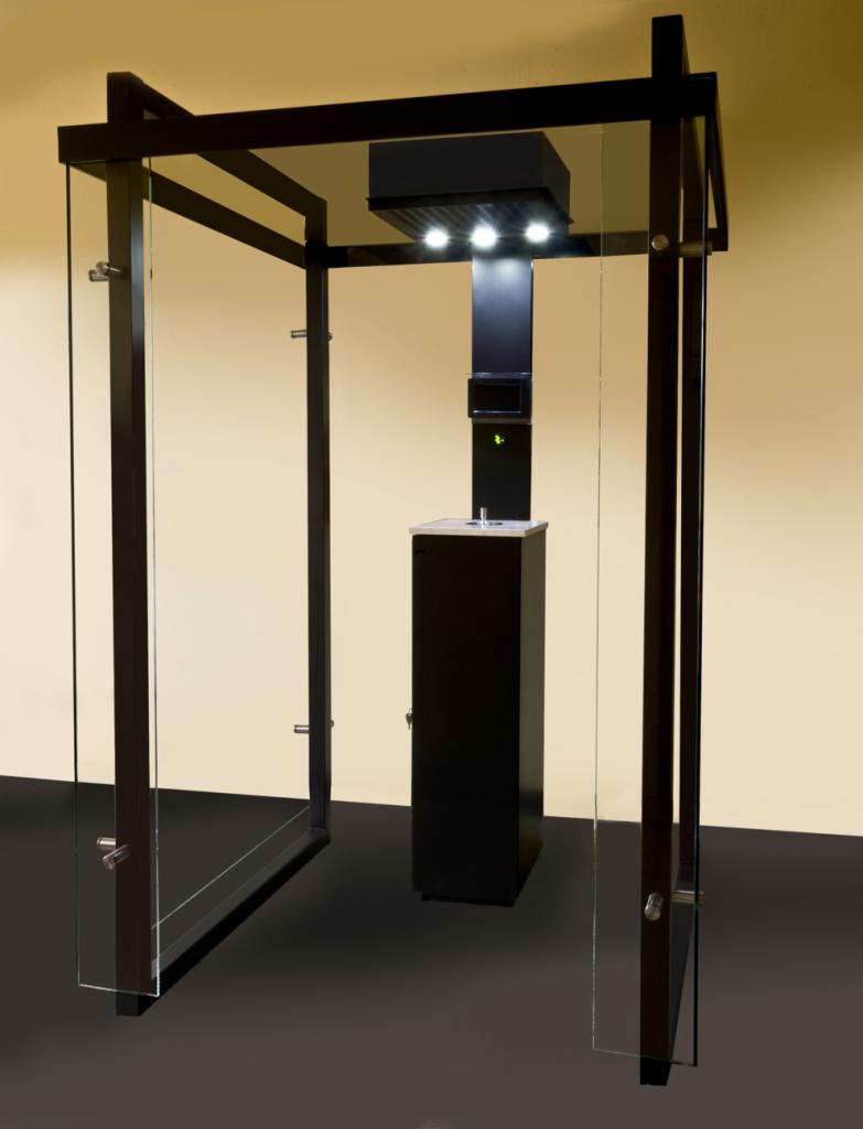 Nowoczesna, minimalistyczna palarnia: czarna, przeszklona konstrukcja z oświetleniem punktowym, umieszczona na ciemnej podłodze, z beżowym tłem.