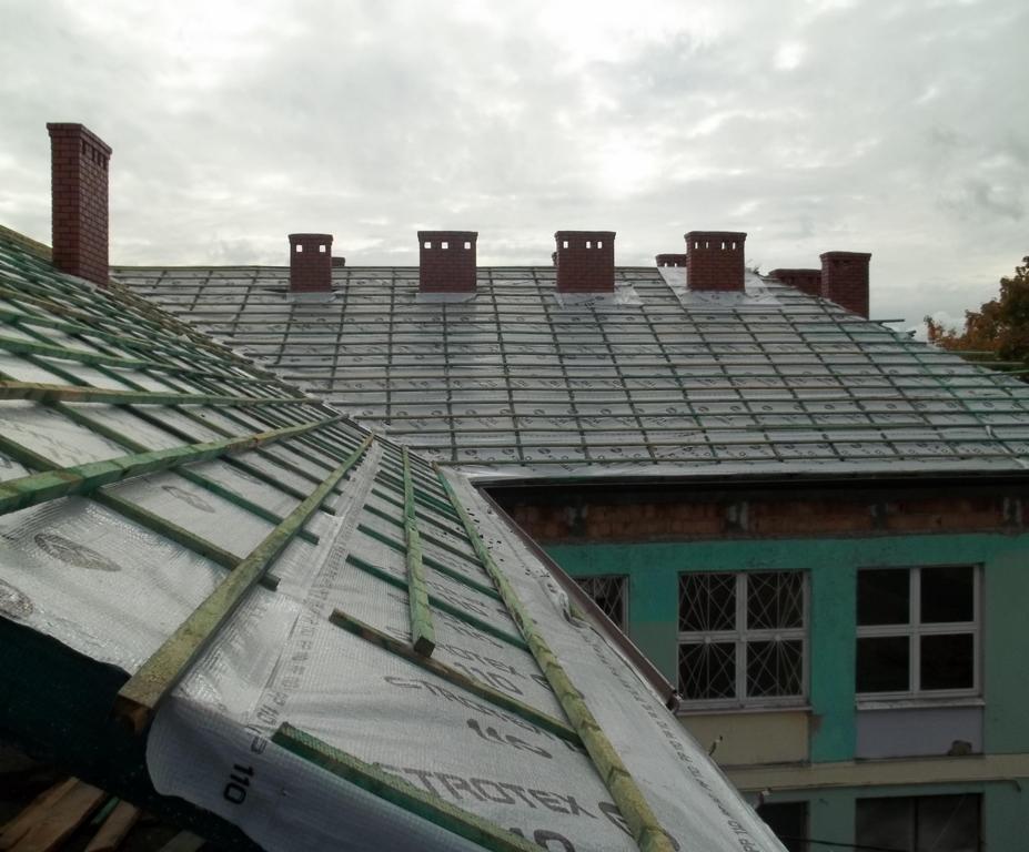 Wykonywanie więźby dachowej wraz z pokryciem