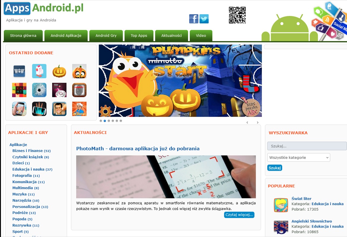 Strona internetowa z aplikacjami na Androida, z nagłówkiem z motywem Halloween, widoczne menu i sekcje z aplikacjami i aktualnościami. Widoczny pasek wyszukiwania.