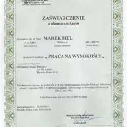 Ukończone szkolenie BHP: Zaświadczenie o ukończeniu kursu 'Praca na wysokości' dla Marka Biela, wydane przez Dalpinex. Certyfikat z datą ważności.