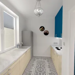 Wizualizacja wąskiej kuchni w Swarzędzu z jasnymi drewnianymi szafkami, marmurowym blatem, wzorzystą podłogą i dekoracyjnymi obrazkami na ścianie, oświetlonej ozdobnym żyrandolem.