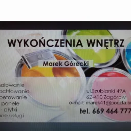 Reklama firmy 'Marek Górecki' oferującej wykończenia wnętrz. Widoczne puszki z farbami i pędzel. Zawiera adres, e-mail i numer telefonu.