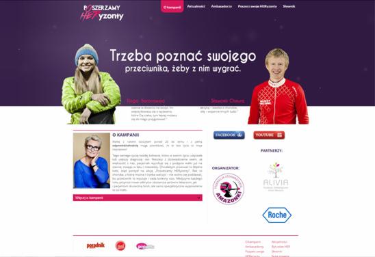 Strona internetowa kampanii społecznej z wizerunkami ambasadorów, fioletowym tłem i hasłem motywacyjnym. Widoczne logotypy partnerów i organizatorów akcji.