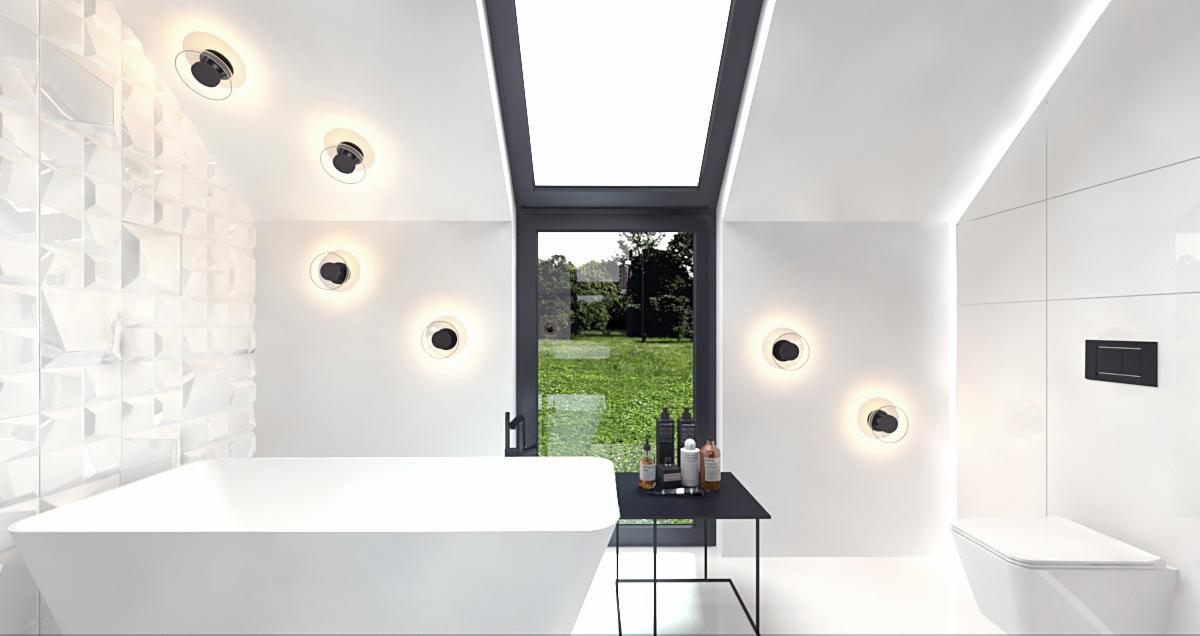 Nowoczesna, minimalistyczna łazienka w Krakowie z białą wanną wolnostojącą, geometryczną ścianą, oświetleniem punktowym i widokiem na zieleń przez duże okno.