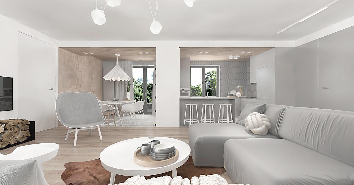Jasne, minimalistyczne wnętrze mieszkania z otwartą kuchnią, jadalnią i salonem; drewniana podłoga, szara sofa z ozdobną poduszką w kształcie węzła, biały stolik kawowy z naczyniami, drewniana...