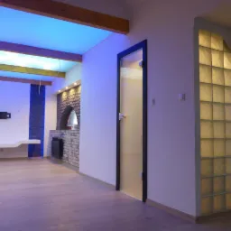 Nowoczesne wnętrze z podświetlanym sufitem imitującym niebo, szklaną ścianą z luksferów, przeszklonymi drzwiami z czarną ramą oraz elementami kamiennej dekoracji ściany i minimalistycznym...