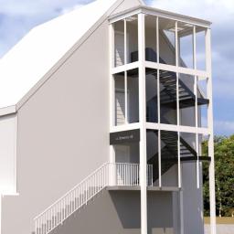 PPHU Tech Mark Emil Lewicki - Wizualizacja zewnętrznych schodów metalowych z balustradą, prowadzących do budynku z szarą elewacją. Schody w metalowej klatce, widoczne niebo i drzewa w tle.