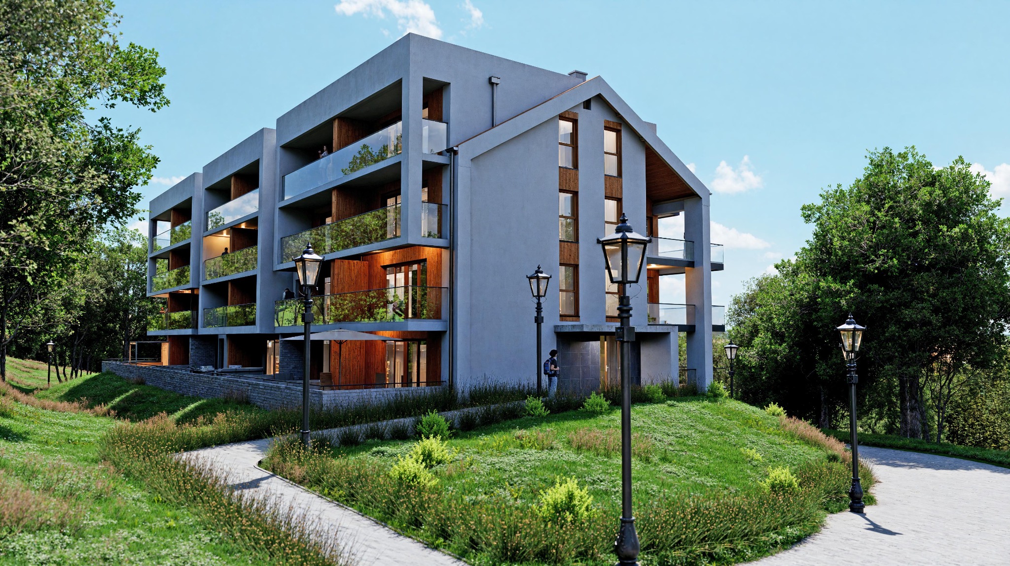 Nowoczesny budynek wielorodzinny z garażem podziemnym w Siedlcach, elewacja frontowa z balkonami wykonczonymi szklem