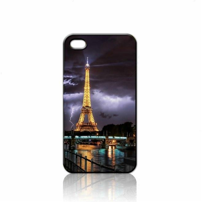 Etui na telefon iPhone 5 z nadrukiem nocnej panoramy Paryża, Wieża Eiffla oświetlona w trakcie burzy z piorunami.