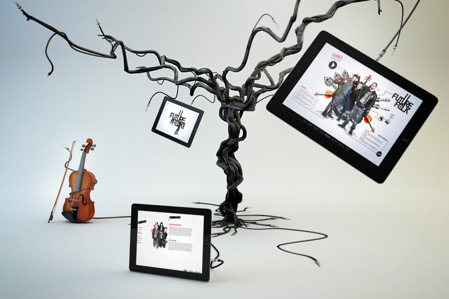 Kreatywna wizualizacja: drzewo z kabli, na gałęziach tablety prezentujące strony internetowe zespołu muzycznego Future Folk, obok skrzypce.