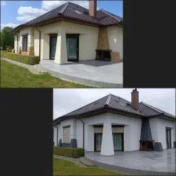 Elegancki dom jednorodzinny z beżową elewacją, brązowym dachem i kamiennym kominkiem zewnętrznym. Widoczny zadbany ogród i szara, kamienna posadzka tarasu.