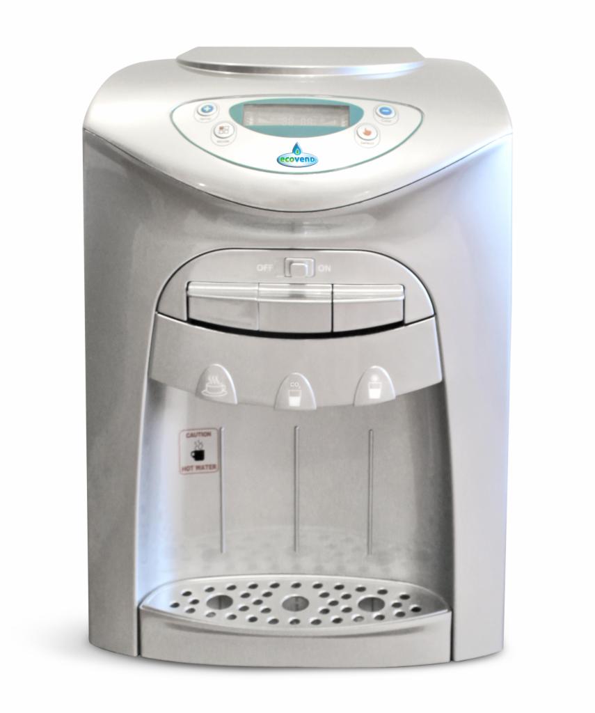 Srebrny dystrybutor wody z wyświetlaczem LCD i przyciskami, widoczne oznaczenia gorącej wody i logo producenta ecovend.