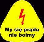 Żółty znak ostrzegawczy z czerwonym symbolem błyskawicy i napisem 'My się prądu nie boimy'.