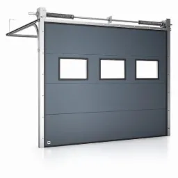 Szara segmentowa brama garażowa z trzema okienkami, oświetlona od dołu, widok z przodu, mechanizm sprężynowy widoczny u góry.