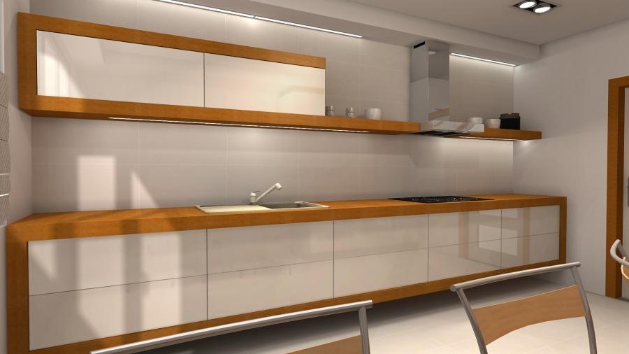 Nowoczesna kuchnia z białymi, błyszczącymi frontami szafek, drewnianym blatem i oświetleniem LED pod szafkami wiszącymi oraz na półce, minimalistyczny okap i płyta indukcyjna.