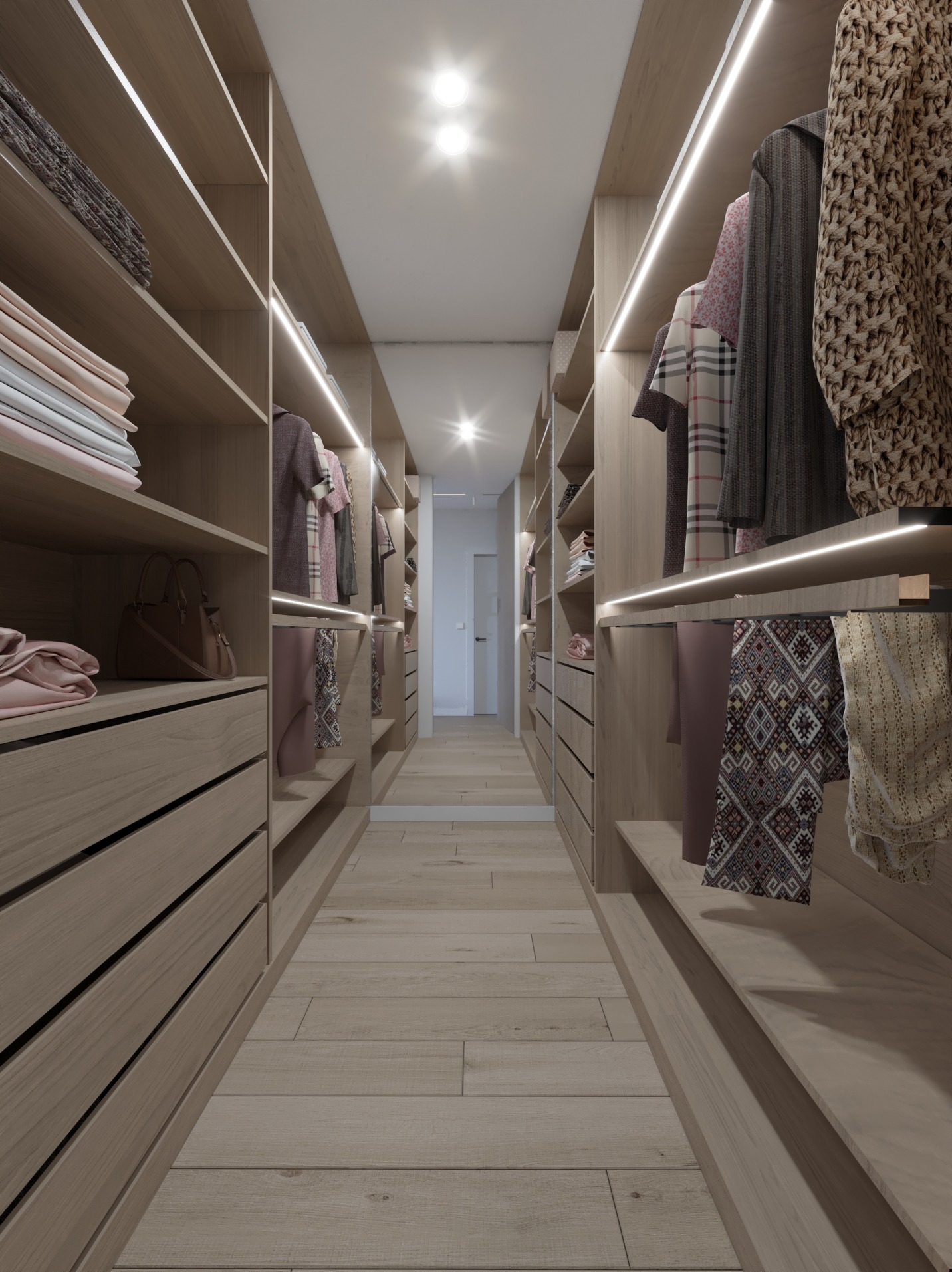 Przestronna garderoba z jasnego drewna, oświetlona listwami LED, z ubraniami poukładanymi na półkach i wiszącymi na wieszakach, widok w głąb pomieszczenia.