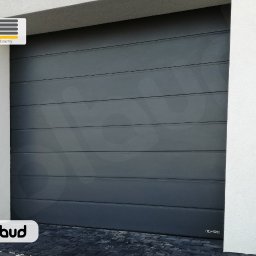 Bramy garażowe segmentowe UniPro Wiśniowski w kolorze grafitowym- realizacja Olbud Straszyn