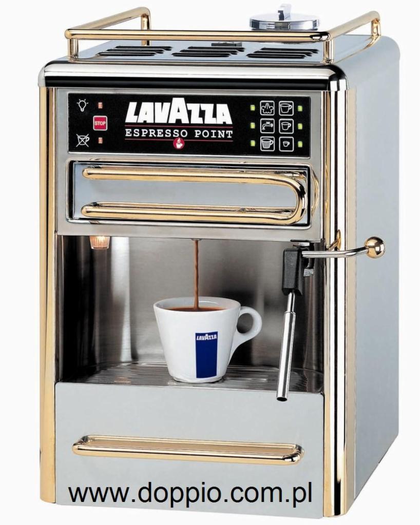 Stylowy ekspres Lavazza Espresso Point w odcieniach szarości i złota, nalewający kawę do filiżanki z logo Lavazza.