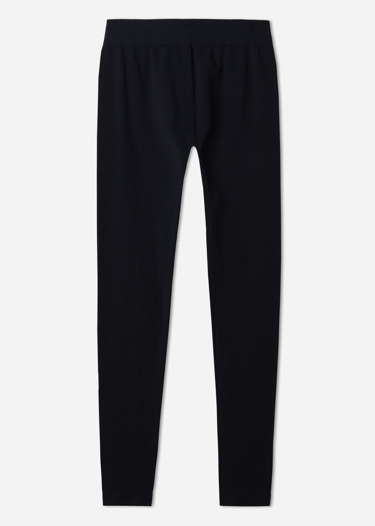 Czarne legginsy damskie z elastycznym pasem, leżące na białym tle, widok z przodu.