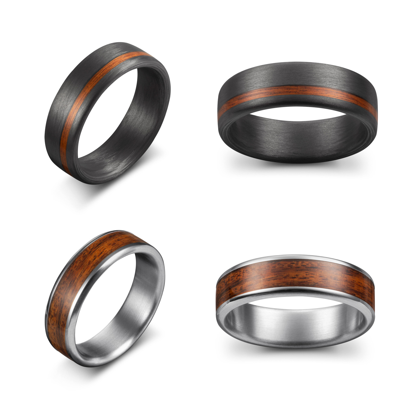 Cztery ujęcia pierścionków: dwa z czarnego karbonu z drewnianą wstawką i dwa ze srebrnego metalu z drewnianą wstawką, na białym tle.