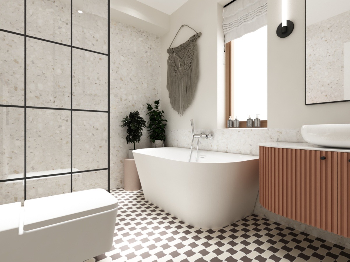 Nowoczesna łazienka z wolnostojącą wanną, umywalką nablatową na szafce z lamelami w kolorze terakoty, mozaikową ścianą i podłogą w szachownicę, uzupełniona dekoracyjną makramą na ścianie.