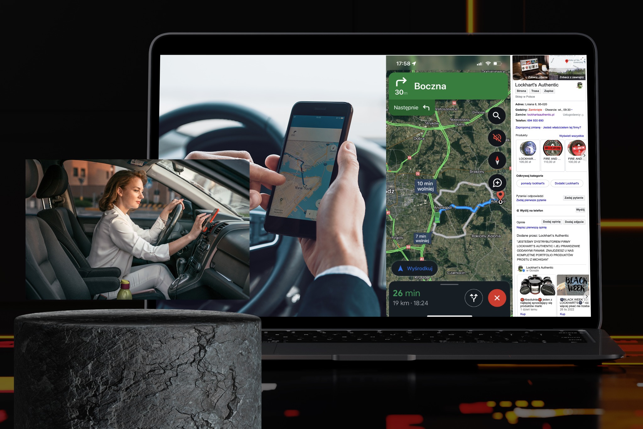 Kobieta prowadzi samochód, korzystając z nawigacji w telefonie zamontowanym na desce rozdzielczej; na ekranie laptopa widoczna mapa Google z zaznaczoną trasą i informacjami o firmie Lockhart's...