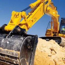 Ukladanie kostki brukowej. Maszynowe ukladanie kostki brukowej. Wykonywanie robót ziemnych.