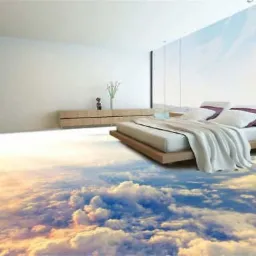 Nowoczesna sypialnia z podłogą imitującą błękitne niebo z chmurami, z łóżkiem na drewnianej ramie i białym pledem, jasne wnętrze z dużym oknem.