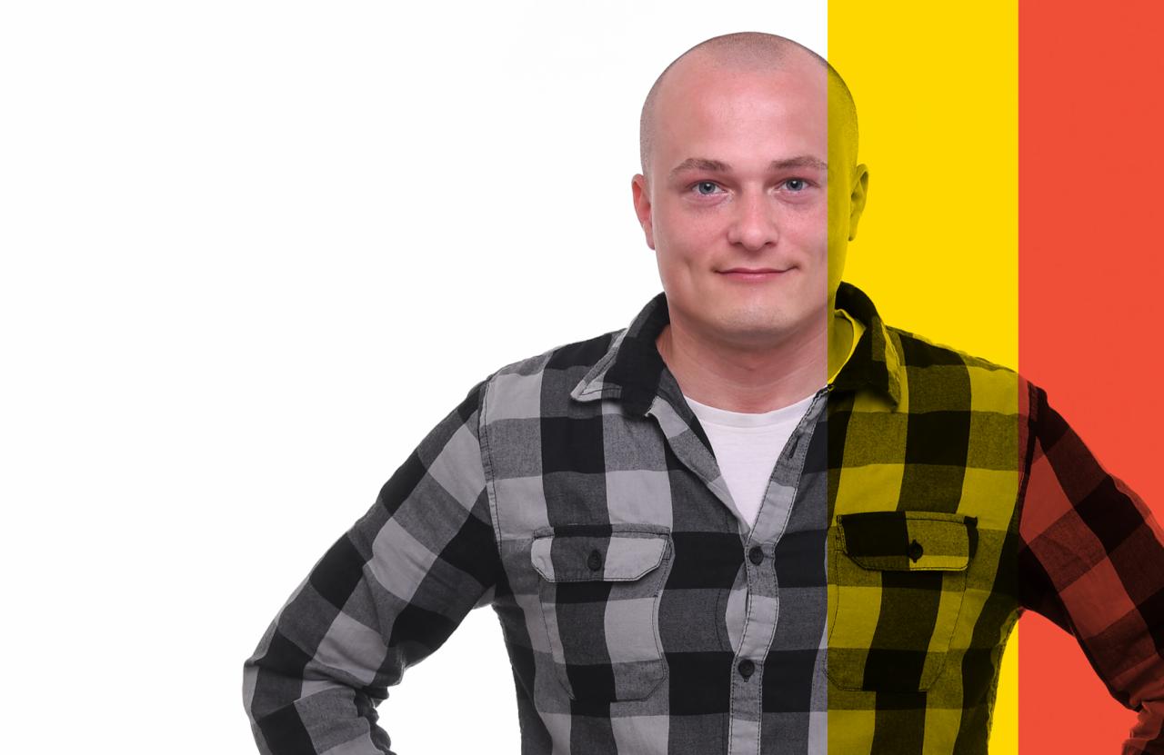 Portret mężczyzny w koszuli w kratę, z nałożonymi kolorami flagi Belgii na połowie twarzy i ubrania.