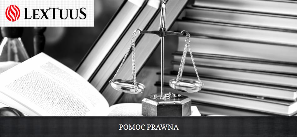 Waga Temidy na tle otwartej księgi i stosu kodeksów w Katowicach. Symbol sprawiedliwości i prawa.