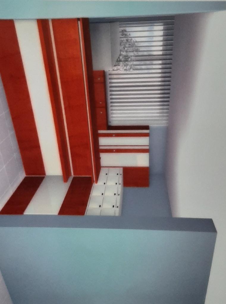 Wizualizacja wnętrza z szafą z przesuwnymi drzwiami w kolorze czerwono-białym, widok na okno z żaluzjami i półki z szufladami, całość utrzymana w minimalistycznej stylistyce.