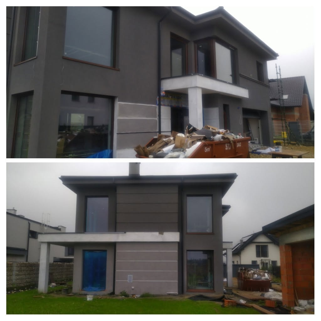 Dwu-kondygnacyjny dom w trakcie prac elewacyjnych, widoczny kontener na odpady budowlane i fragmenty niezakończonych prac na fasadzie.