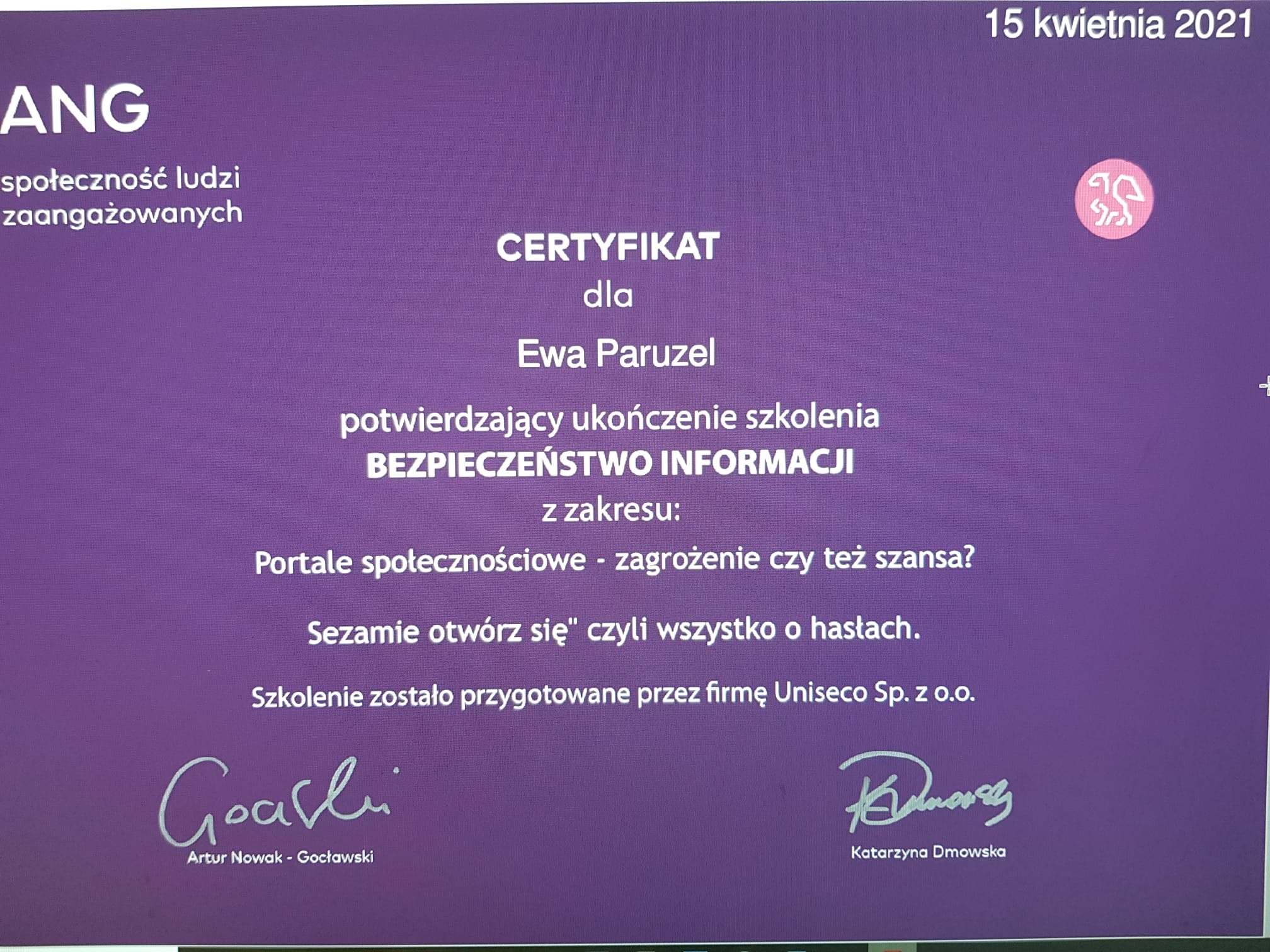 Skan certyfikatu ukończenia szkolenia z bezpieczeństwa informacji dla Ewy Paruzel, wydany 15 kwietnia 2021 roku, z logiem ANG i podpisami Artura Nowaka-Gocławskiego i Katarzyny Dmowskiej.