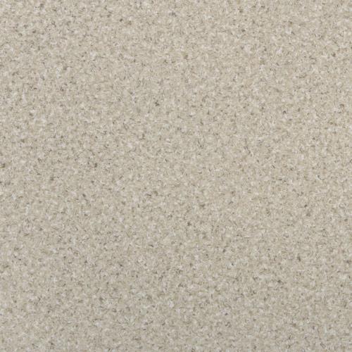 Beżowa wykładzina PCW o drobnej, nieregularnej strukturze z widocznymi ciemniejszymi i jaśniejszymi plamkami, przypominająca naturalny kamień.