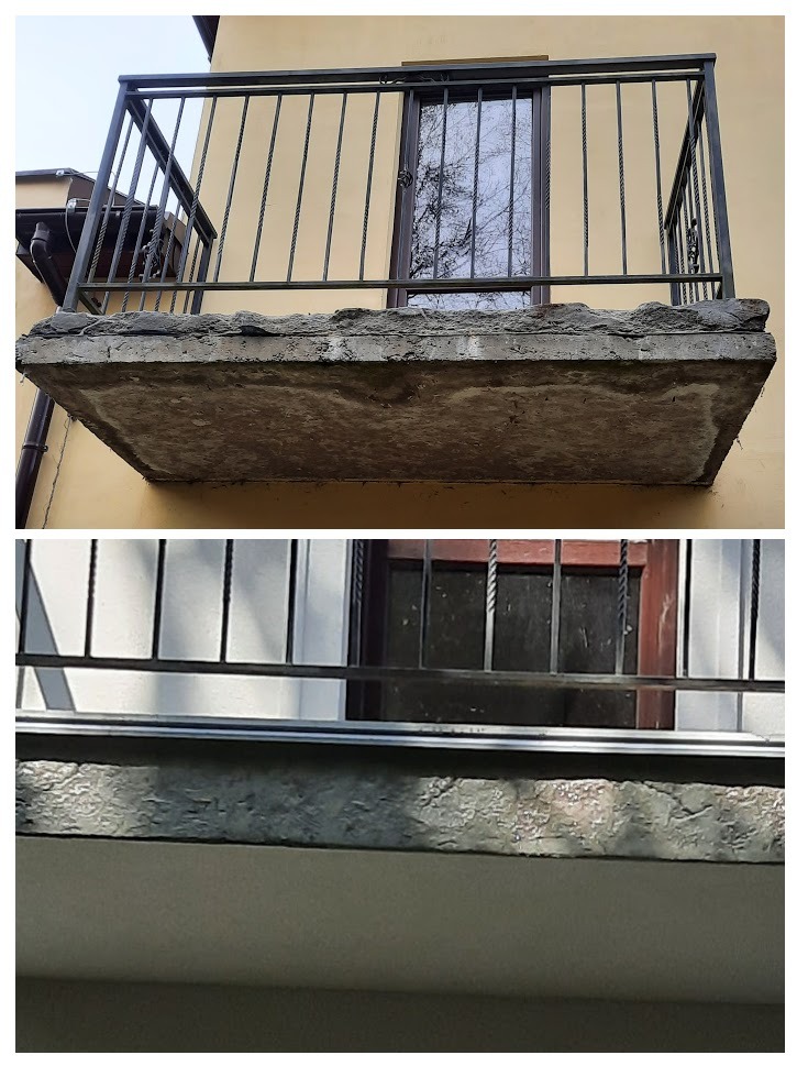Balkon z metalową balustradą i betonową płytą, widok z dołu. Widoczne ślady napraw i renowacji betonu. Okno z kratą w tle.